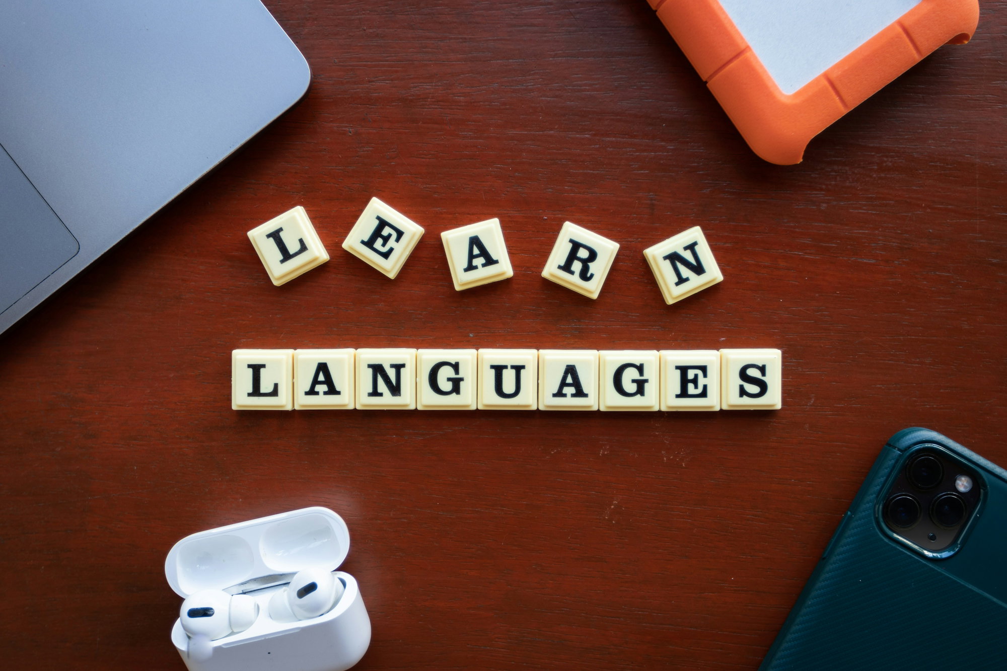 the-word-learn-languages-spelled-out-of-scrabble-tiles.jpg the word learn languages spelled out of scrabble tiles